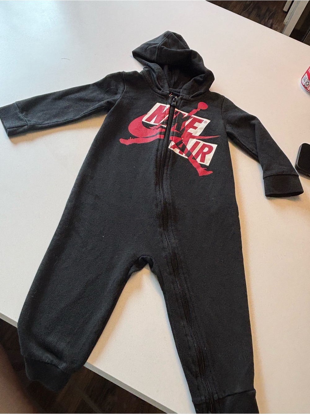 Jordan Black Kids One-Piece Footie with Red Logo